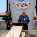 County Commission Chairman Dave Sullivan speaking today at the county's virtual press conference from the Emergency Operations Center, with Emergency Chief Jonathan Lord and Health Department Chief Bob Snyder. The conference had an interpreter for the deaf. (© FlaglerLive via Zoom)